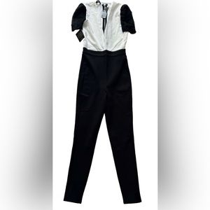 Bebe Women's US 4 Katherine Lace Blocked Jumpsuit Jet Black 15WCD900195-001 NWT